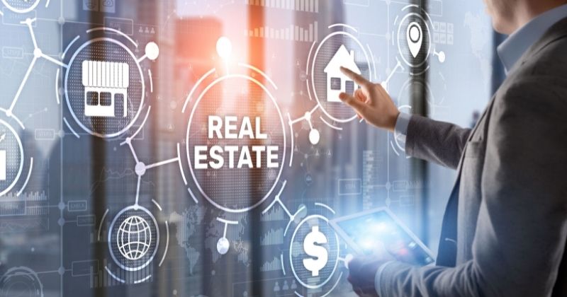 Digital Marketing for Real Estate – a hand touching a virtual real estate board
