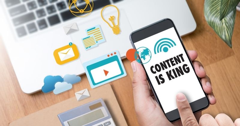 Why is Content Marketing Important – cell phone with content is king written on the display.